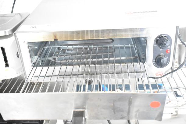Carnival King 382CPO12TS stainless steel countertop pizza oven with adjustable thermostat, 120V, in good condition.