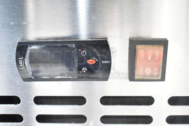 Close-up of control panel on Avantco 178APPT91HC commercial pizza prep table, featuring digital display and switch.