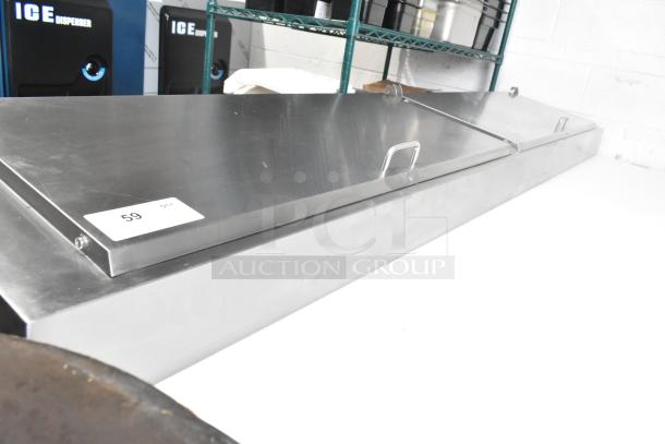 2024 Avantco 178APPT91HC commercial pizza prep table with stainless steel top, hinged lids, and commercial casters. Tag: 59.