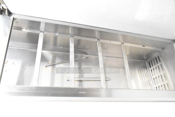 2024 Avantco 178APPT91HC Commercial Pizza Prep Table in silver, stainless steel interior, on casters. 115V, 1 Phase.