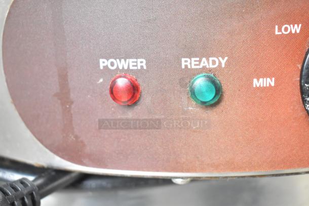 Waring WSC160 16" Electric Crepe Maker control panel showing power and ready indicator lights. 120 Volts, 1 Phase.