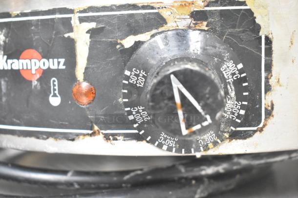 Krampouz CEBIR4BS 16" electric crepe maker control panel. Visible wear; temperature dial shows Fahrenheit and Celsius settings.