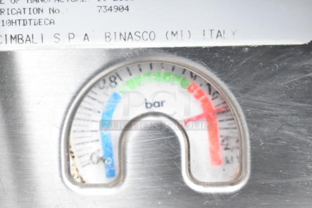 Close-up of the pressure gauge on a La Cimbali M29 Select DT/2-NF espresso machine, showing pressure levels in bars.