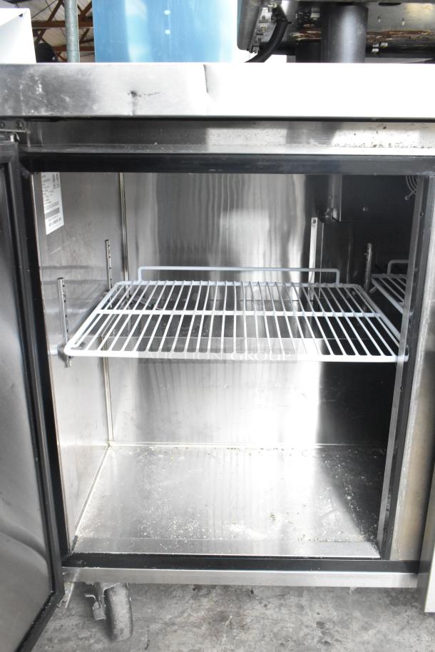 2019 Migali C-U72R-HC undercounter cooler, stainless steel interior, on commercial casters, visible shelf and label, 115V, 1 phase.