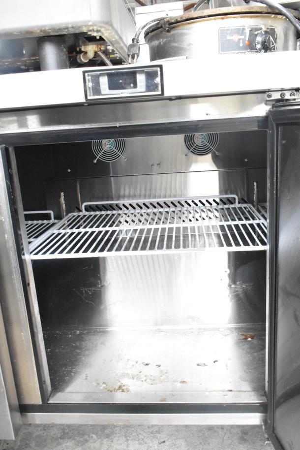 2019 Migali C-U72R-HC 3 Door Undercounter Cooler, 115V, 1 Phase, on commercial casters. Stainless interior, used condition.