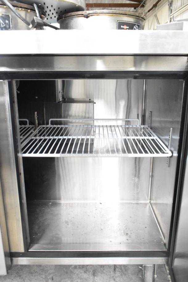 2019 Migali C-U72R-HC commercial 3-door undercounter cooler on casters, stainless interior, 115V, clean condition.