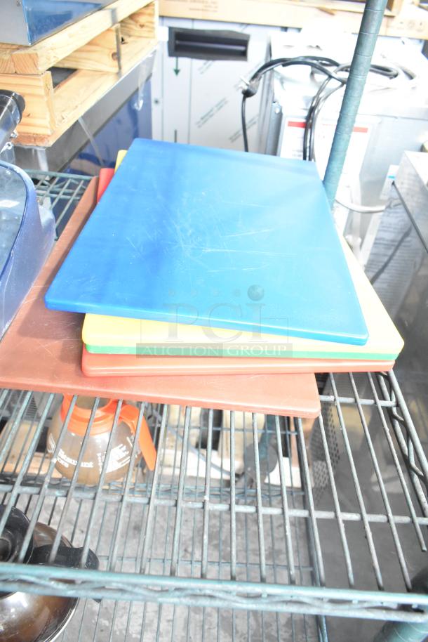 Three-tier shelf with various items including colorful poly lids, cylindrical bins, and coffee pots. Visible wear on surfaces.