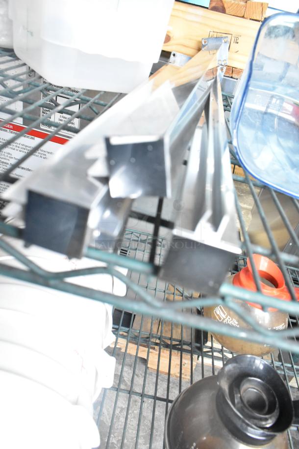 Three-tier shelf with metal bars, coffee pots, poly bin lids, and cylindrical bins. Items in used condition.