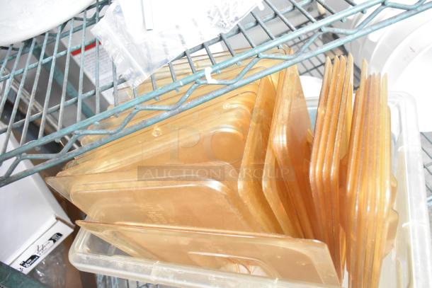 Three-tier shelf with poly drop-in bin lids. Includes coffee pots, cylindrical bins. Good condition, ideal for storage.