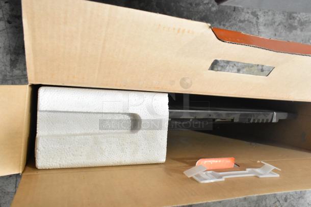 Onn Roku Smart TV in original packaging, partially visible in open box with protective foam. Buyer pickup required.