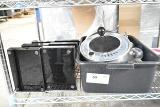 19 various items including metal bins and a black poly 3-tier rack on metal shelf; tag shows "69 QTY x19".