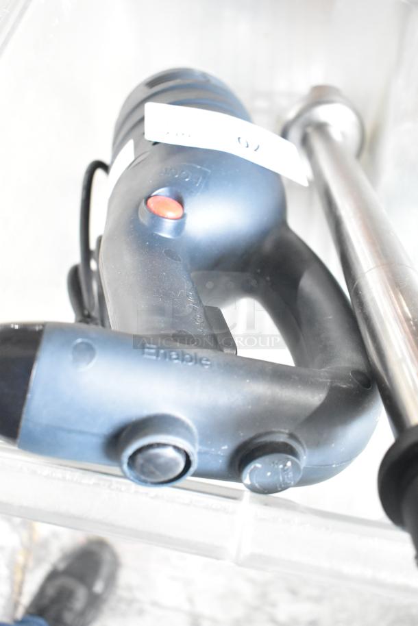 AvaMix 928IBHD18 18" heavy-duty immersion blender with variable speed, 1 1/4 hp, in good condition. Label visible.