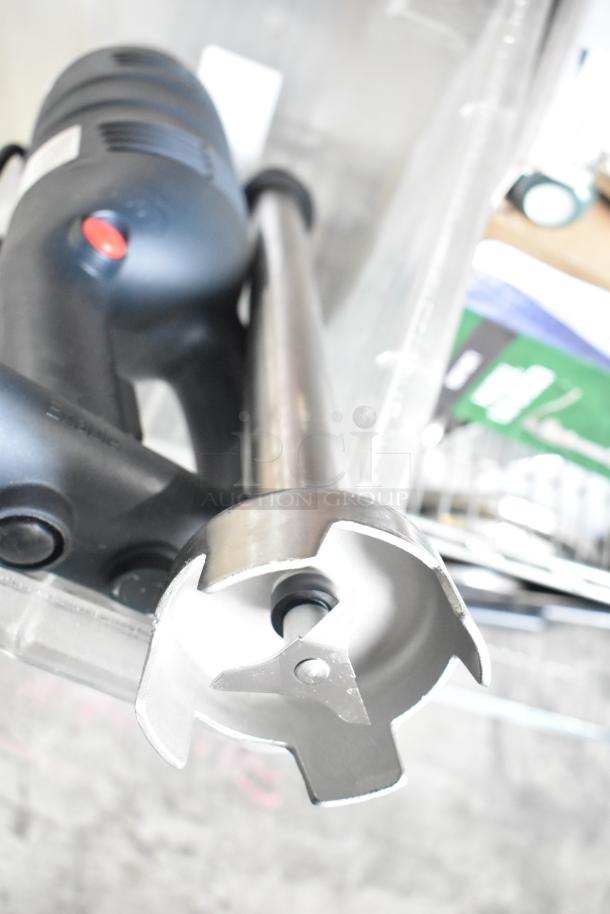 AvaMix 928IBHD18 18" immersion blender, heavy-duty, variable speed, 1 1/4 hp, 115V, used, stainless steel shaft visible.