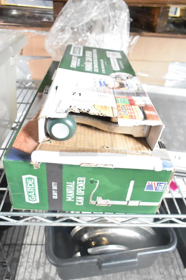 Brand new Garde commercial can openers in box, models 181COM2NB and 181COM1BSTMA, bid for two units.