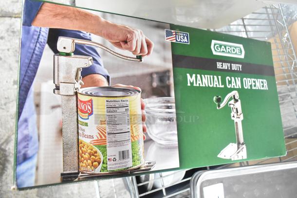 Brand new Garde commercial manual can opener in box, models 181COM2NB and 181COM1BSTMA. Made in USA.