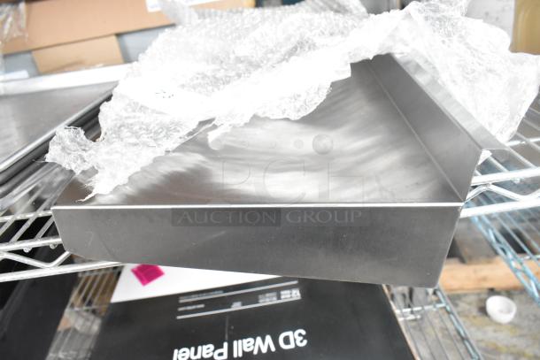 Metal shelf in excellent condition, wrapped in bubble wrap. Smooth steel finish, ideal for storage solutions.