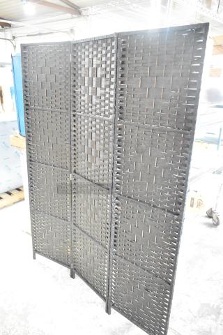 Trifold wicker-style room divider with a woven pattern, in good condition. Freestanding, versatile for interior use.