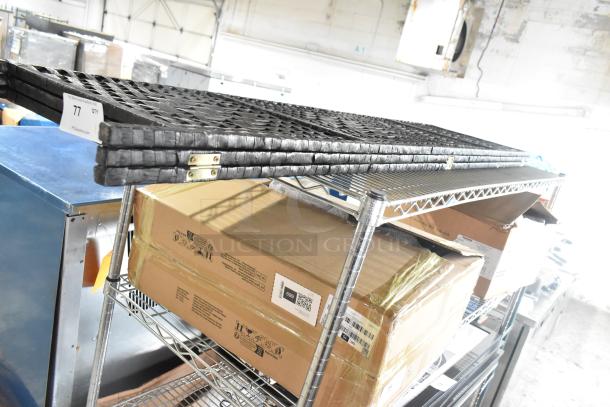 Trifold wicker style room divider with black woven panels, metal hinges, and lightweight design. Appears in good condition.