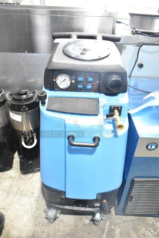 BRAND NEW Mytee 1003DX-230 Speedster carpet extractor, 10-gallon, heated, 230V, light scratches, blue and black design.