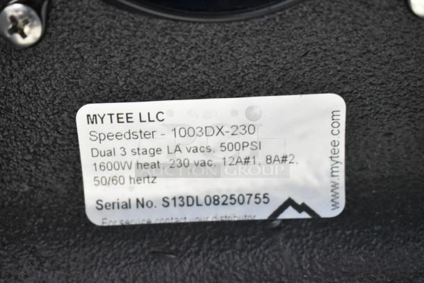 Alt text: Label on Mytee 1003DX-230 Speedster Carpet Extractor showing model details and serial number S13DL08250755.