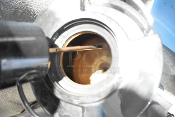 Avantco 177CS15 VT15-001 1.5 Gallon Thermal Coffee Server, interior view, showing metal construction and condition.