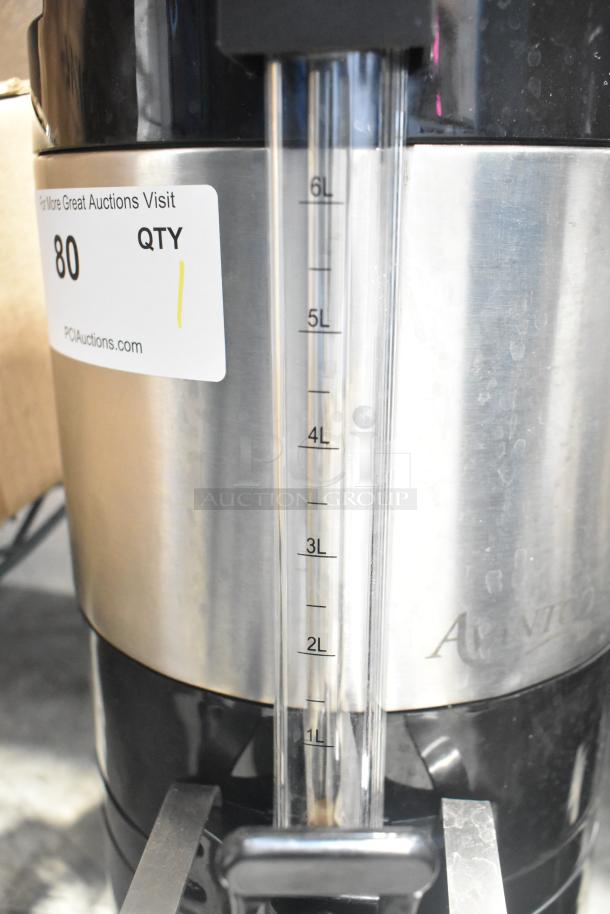 Avantco 177CS15 VT15-001 1.5 Gallon Thermal Coffee Server with stand, stainless steel, visible 6L capacity gauge, good condition.