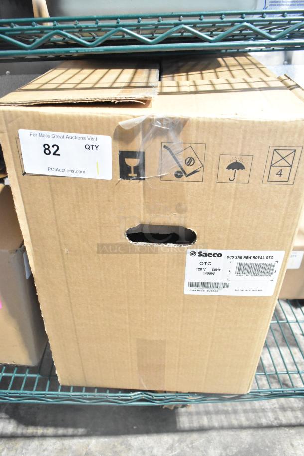 Cardboard box with Saeco OCS SAE New Royal OTC Espresso Machine, 120V, 1400W. Labeled "Scratch and Dent."