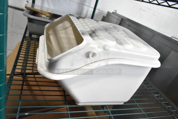 Two-tier lot with poly drop-in bin, utensils, and ingredient bin on metal shelving. Multiple kitchen items included.