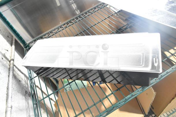 Two-tier lot with poly drop-in bins, utensils, and ingredient bins on metal shelving. Items appear in good condition.