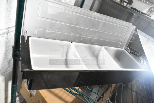 Two-tier lot with poly drop-in bins. Includes utensils and an ingredient bin. Visible clear lids. Suitable for efficient organization.