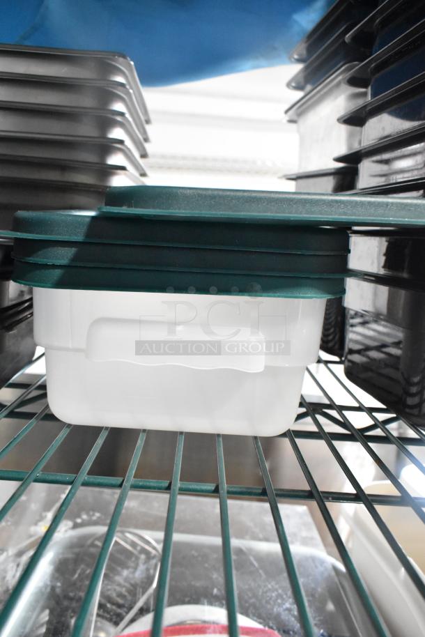 Two-tier lot with poly drop-in bins, utensils, and ingredient bin on a wire shelf. Items appear in good condition.