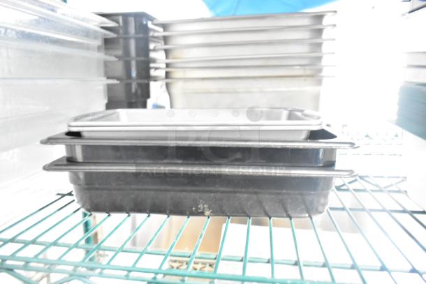 Two-tier lot includes poly drop-in bins stacked on shelf. Additional items include utensils and an ingredient bin.