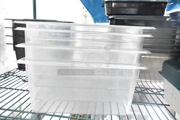 Stacked clear poly drop-in bins on a shelf, each marked with quantity measurements, part of a two-tier auction lot including utensils and an ingredient bin.