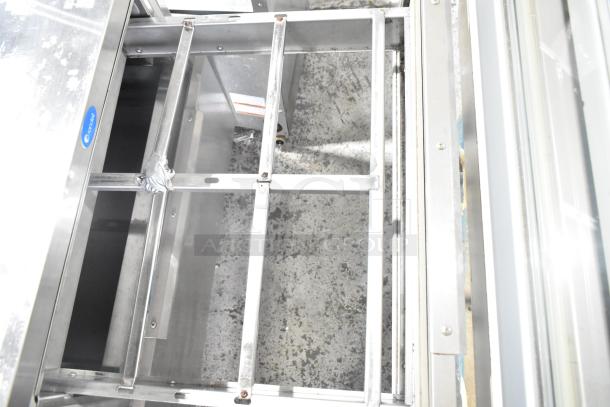 Randell commercial 2-drawer cooler, stainless steel, 115 volts, 1 phase, showing interior compartment with divider rails.