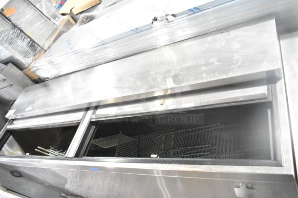 Krowne BC72-SS commercial back bar bottle cooler with two sliding lids, stainless steel finish, 115 volts, 1 phase.