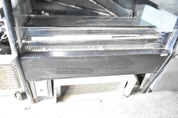 Structural Concepts Oasis CO47R commercial grab-n-go merchandiser, black finish, 220V, 1 Phase; visible wear, model label shown.