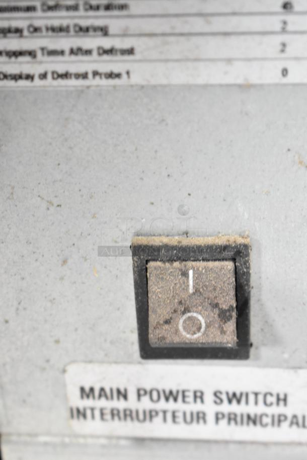 Structural Concepts Oasis CO47R power switch with dust, label reads "Main Power Switch/Interrupteur Principal".