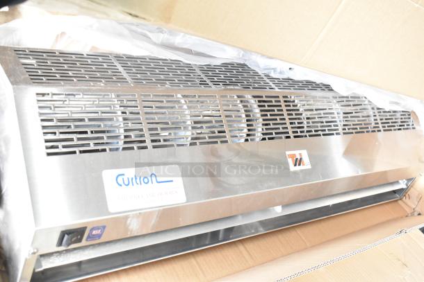 Brand new Curton PRO=AP-2-36-1-SS air curtain, 120V, 1 phase, slight scratches, in original packaging, showing logo and switch.