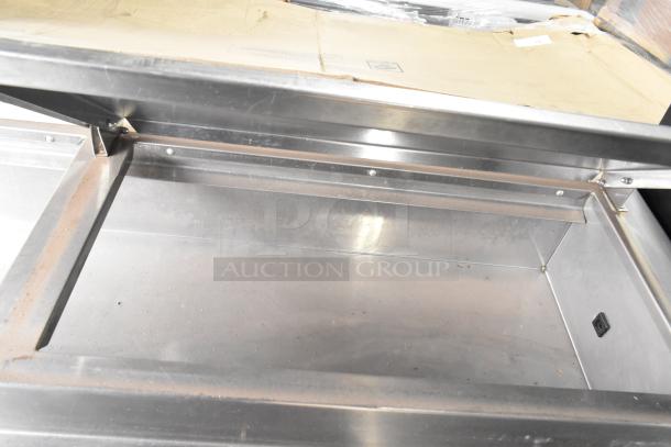 Delfield 18672PTBM-C pizza prep table, stainless steel, 2 drawers, 1 door, 115V, 1 phase, clean interior, good condition.