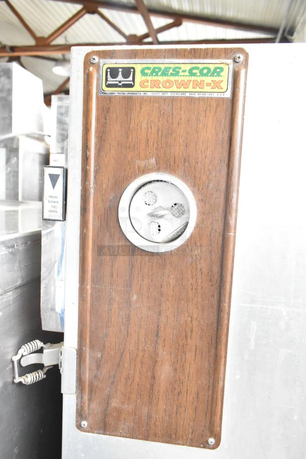Cres-Cor Crown-X Commercial Holding Cabinet with wood panel, visible branding, on commercial casters, in used condition.