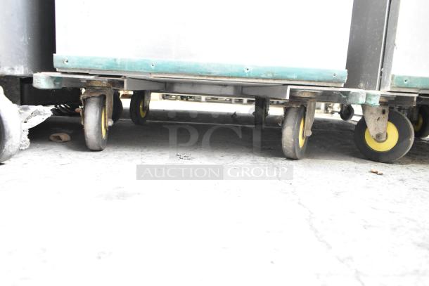 Cres-Cor Crown-X Commercial Holding Cabinet on Casters. Shows commercial-grade wheels, slight wear visible.