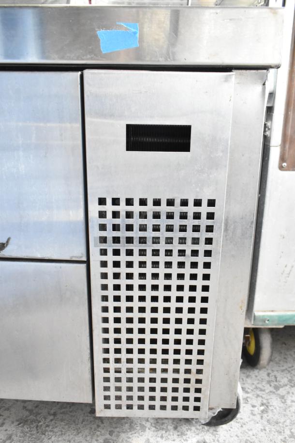 True TRCB-36 commercial 2-drawer chef base on casters. Stainless steel, durable condition, 115V, 1 phase.