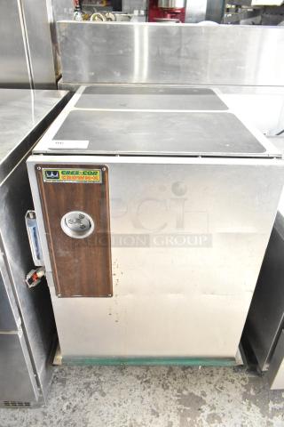 Cres-Cor Crown-X commercial holding cabinet with casters, stainless steel, visible wear, model label on front panel.