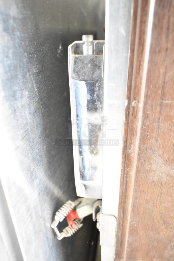 Cres-Cor Crown-X Commercial Holding Cabinet with metal latch detail, on commercial casters, showing moderate wear.