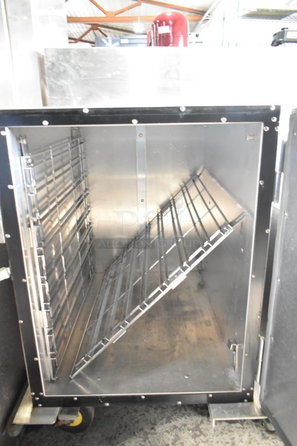 Cres-Cor Crown-X commercial holding cabinet, stainless steel, on casters, interior rack, good condition.