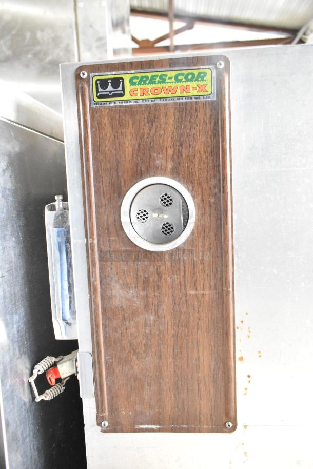 Cres-Cor Crown-X commercial holding cabinet on casters, wooden panel, metal finish, visible Cres-Cor label, used condition.