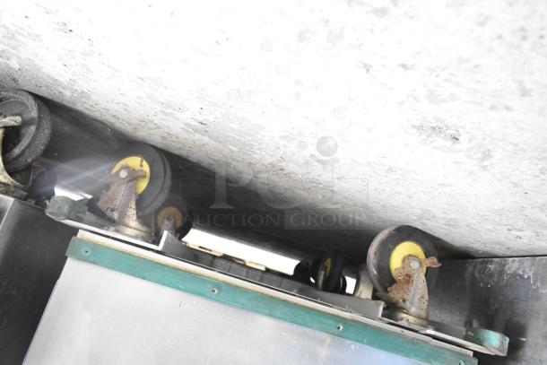 Cres-Cor Crown-X holding cabinet; visible commercial casters in well-used condition, indicating mobility.