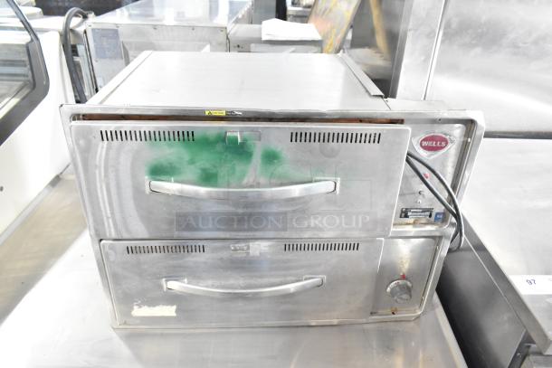 Wells W23HD Commercial 2 Drawer Warming Drawer, stainless steel, visible wear, 120 Volts, 1 Phase, Wells logo on side.