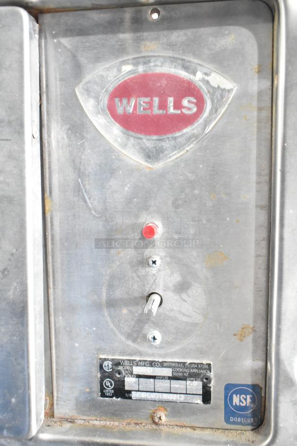 Wells W23HD commercial 2-drawer warming drawer, 120V, 1 phase. Stainless steel with manufacturer and NSF certification labels.