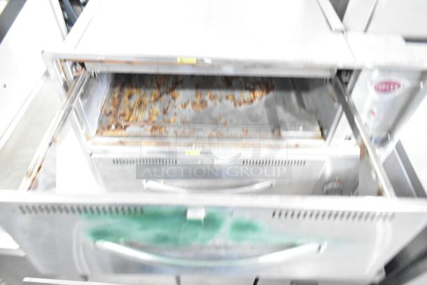 Wells W23HD Commercial 2 Drawer Warming Drawer, used, signs of rust and wear, 120 Volts, 1 Phase, visible Wells logo.